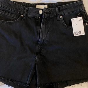 Black denim shorts
